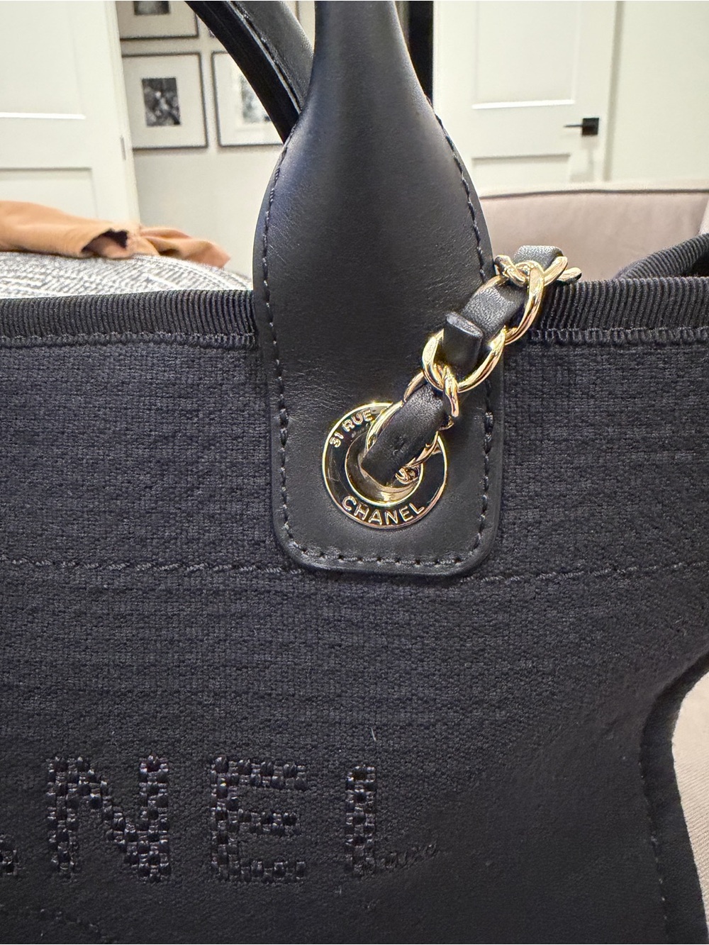 CHANEL Black Canvas Tote with Leather Handles and Gold Chain Accents - Picture 3 of 14